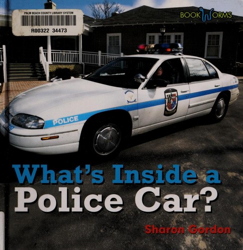 What's Inside a Police Car (Gordon, Sharon. Bookworms. What's Inside?,) book cover